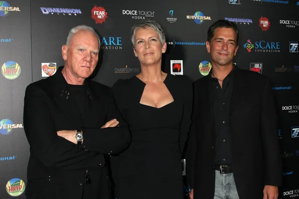 Malcolm McDowell, Jamie Lee Curtis, Malek Akkad — Stock Photo, Image