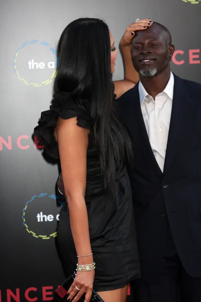 Kimora Lee Simmons y Djimon Hounsou —  Fotos de Stock