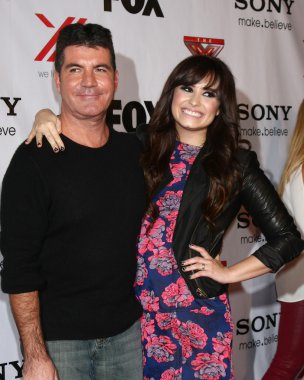 Simon Cowell, Demi Lovato