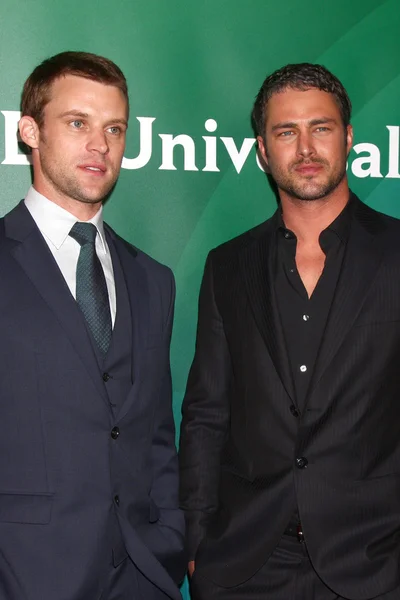 Jesse Spencer, Taylor Kinney — Stockfoto