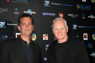 Malek Akkad ve Malcolm Mcdowell