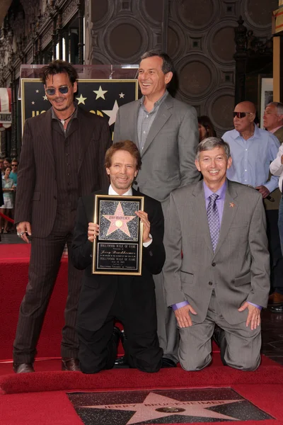 Bob iger, jerry bruckheimer, johnny depp, leron gubler — Foto Stock