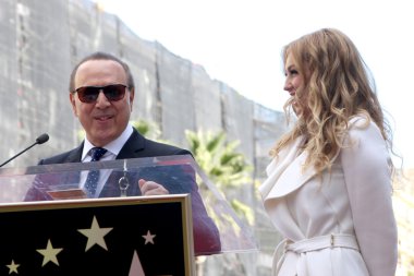 Thalia, Tommy Mottola