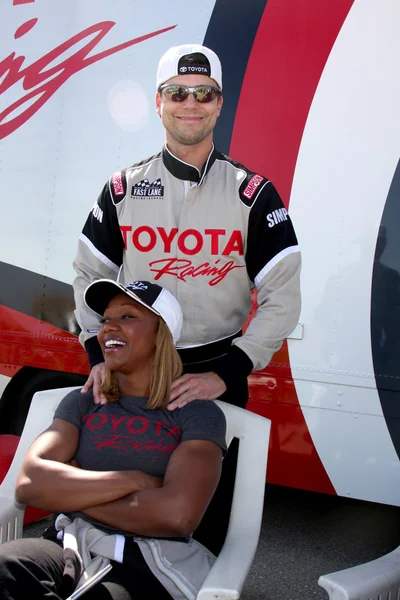 Colin Egglesfield, Carmelita Jeter — Stok fotoğraf