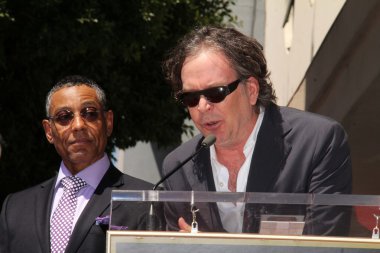 Giancarlo Esposito, Timothy Hutton