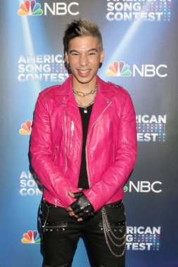 LOS ANGELES - 21 Mart 2022 'de Amerika Şarkı Yarışması' nda Hıristiyan Pagan Universal Back Lot 'ta Kırmızı Halı Şovu