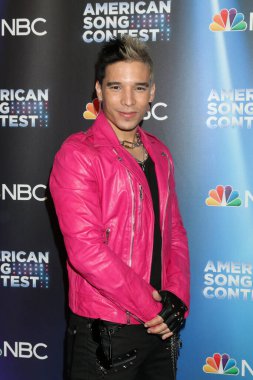 LOS ANGELES - 21 Mart 2022 'de Amerika Şarkı Yarışması' nda Hıristiyan Pagan Universal Back Lot 'ta Kırmızı Halı Şovu