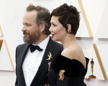 Peter Sarsgaard, Maggie Gyllenhaal, 27 Mart 2022 'de Dolby Tiyatrosu' ndaki 94. Akademi Ödülleri 'nde.