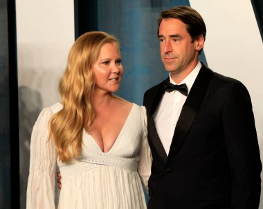 Amy Schumer, 27 Mart 2022 'de Wallis Annenberg Gösteri Sanatları Merkezi' ndeki Vanity Fair Oscar partisinde Chris Fischer.