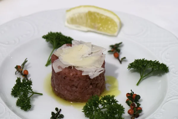 Carne cruda with parmesan — Stock Photo, Image