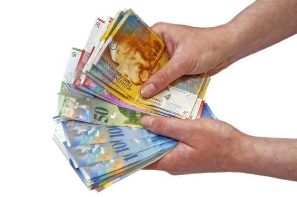 Swiss francs banknotes hold in female hand — Stock Photo, Image