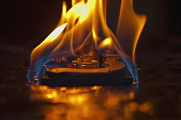 Hard disk drive burning — Stock Photo, Image