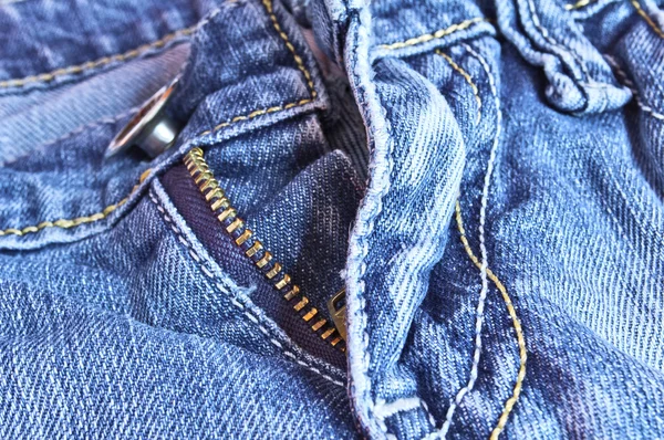 Calças jeans azuis com um zíper aberto — Fotografia de Stock