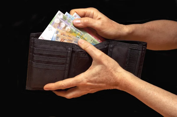 Fekete pénztárca, pénzzel — Stock Fotó