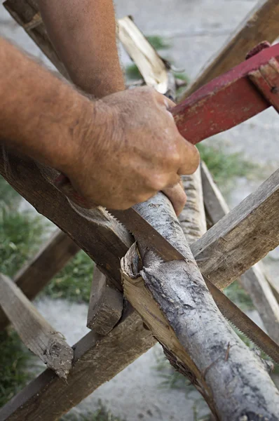 Hand cutting wood — Stock Photo, Image