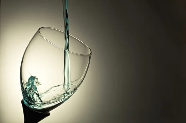 Water splash in glass — Stock Photo, Image