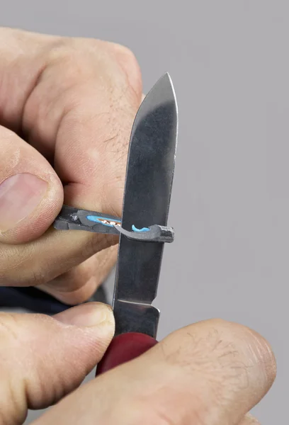 Electrician cutting a wire. — Stok fotoğraf