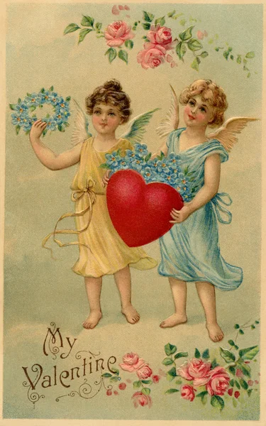 A vintage Valentine postcard with two angels holding a heart and — Stock Photo, Image