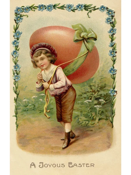 A vintage Easter postcard of a child with a large egg on his bac — Stock Photo, Image