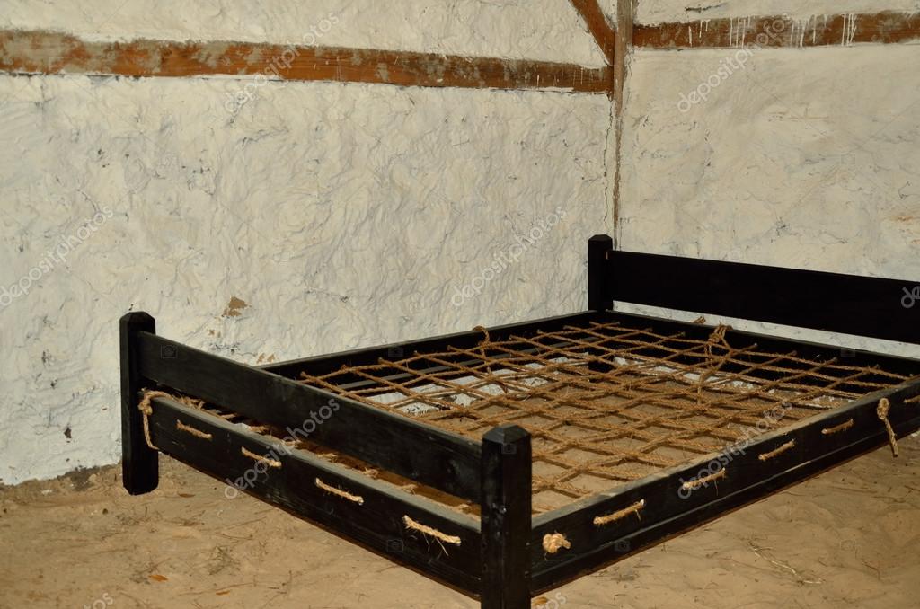 Rope Bed Replica Stock Photo Debuskphoto 21126609 A Replica Of Rope Bed That Would Have Been Constructed This Way In The 19th Century Photo By Debuskphoto