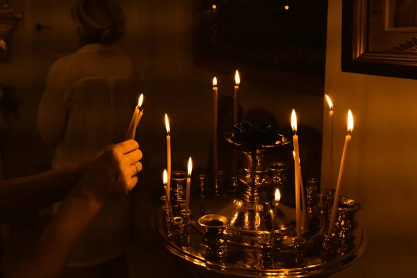 Christian Woman Lights Her Candles Burning Candle Golden Altar Which — Stock Photo, Image