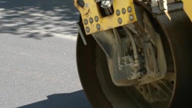 Replacing old asphalt when repairing the road surface. Road rollers level new hot asphalt. Road repair in Europe. Repair and reconstruction of pavement in Europe.