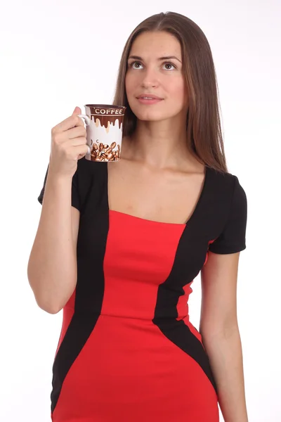 The beautiful girl holds a cup of coffee — Stock Photo, Image