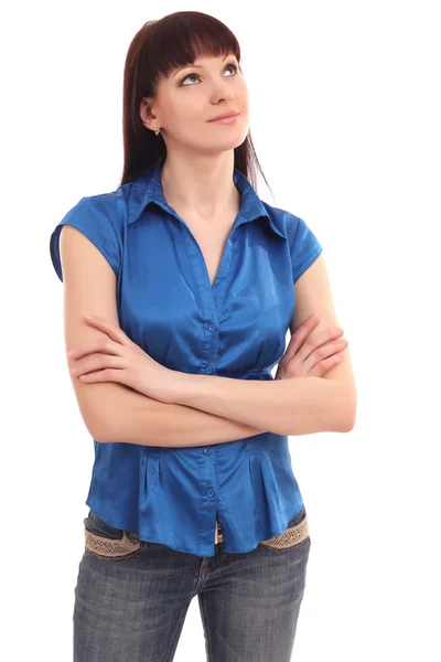 A mulher em uma blusa azul pensativamente olha para cima — Fotografia de Stock