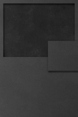 Koyu beton arka planda siyah dikdörtgen modeller. Tasarım elemanları ya da portföy. Boşluğu kopyala.