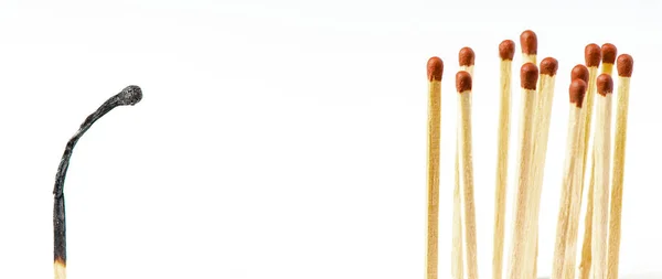 Burnt matches on a white background. The concept of burnout syndrome at work. Copy space. — Stock Photo, Image