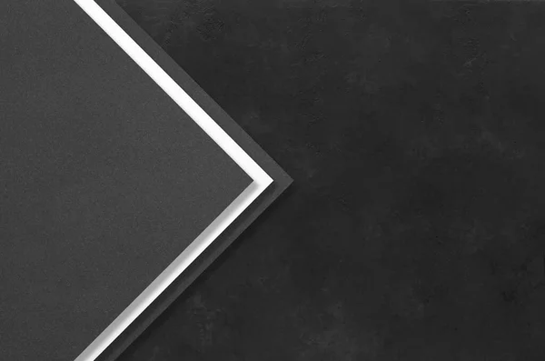Black rectangular mockups on a dark concrete background. Design elements or portfolio. Copy space — Stock Photo, Image