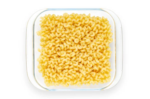 Pasta in einem Glasteller. Isoliert auf Weiß. — Stockfoto