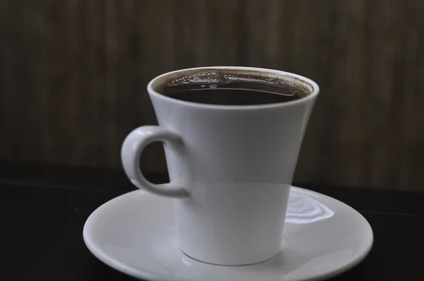 Чашкою кави — стокове фото