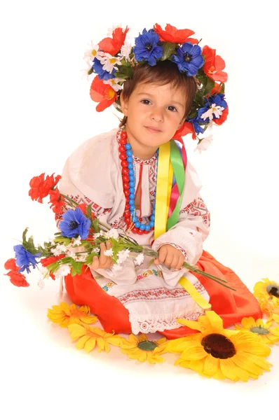Cute girl in ukrainian national dress and wreath — Stock Photo, Image