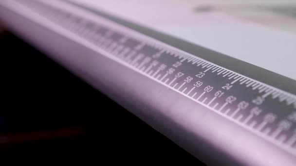 Camera moves along the cutting ruler in the textile industry — Stok video