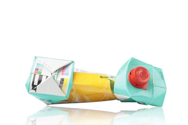 Crushed drink juice box isolated on white — Stock Photo, Image