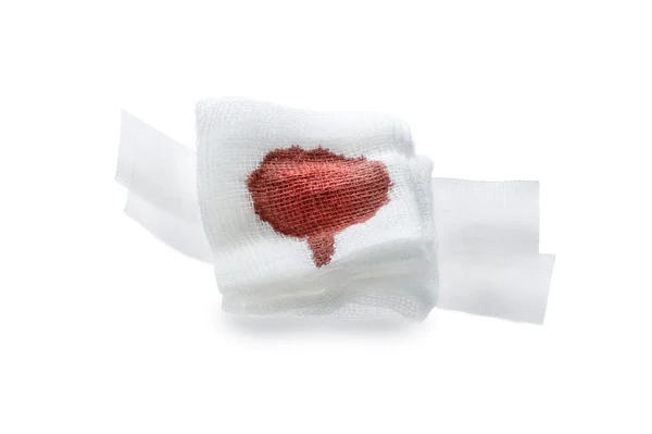 Gauze bandage with blood  on white. — Stock Photo, Image