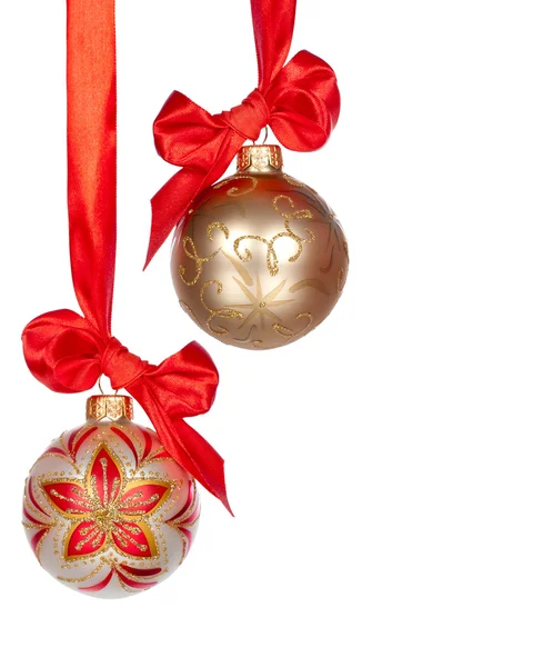 Christmas baubles with ribbon isolated on white Royalty Free Stock Photos