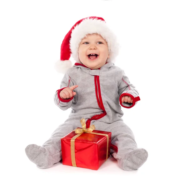 Ізольовані дитини в Санта hat, граючи з Різдво Подарункова коробка Стокове Фото