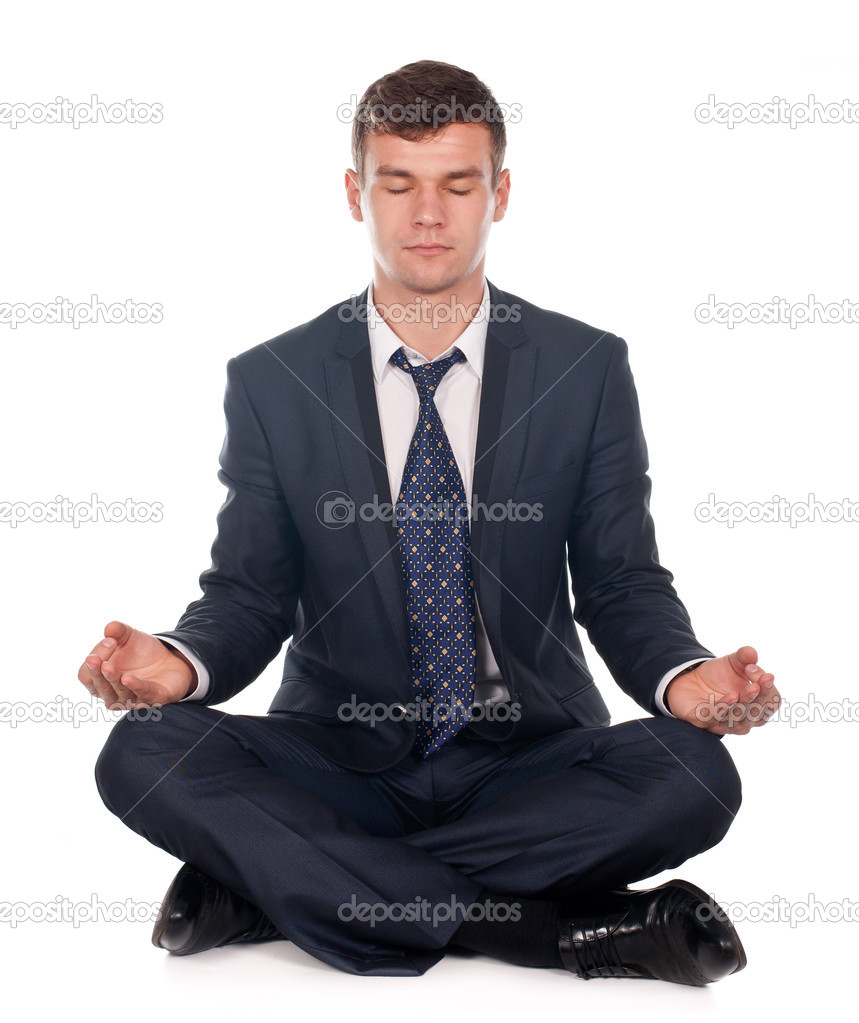 Businessman sitting in lotus position isolated on white