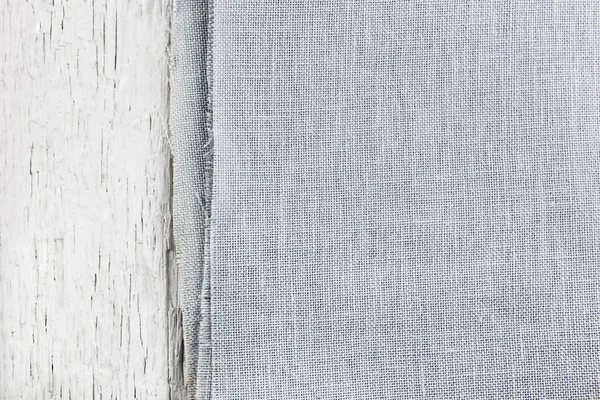 Texture canvas fabric on wooden background