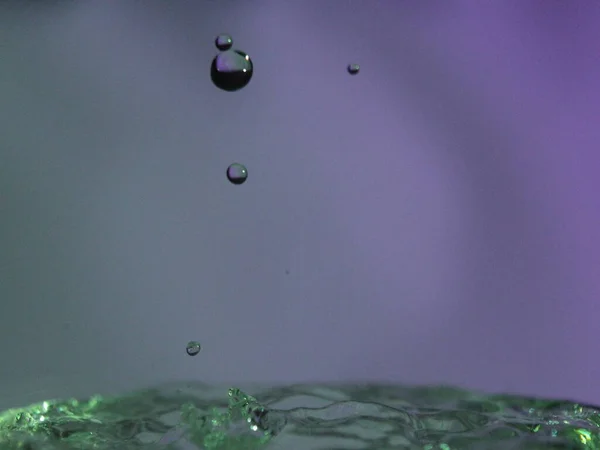 Аннотация Colors Colliding Drops Different Fluids Funds Forms — стоковое фото