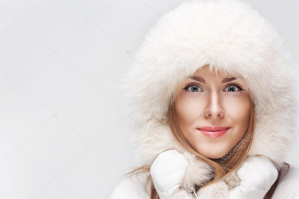 Winter portrait of young smiling woman