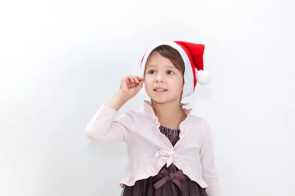 Kerstmis kind in Kerstman hoed op witte achtergrond — Stockfoto