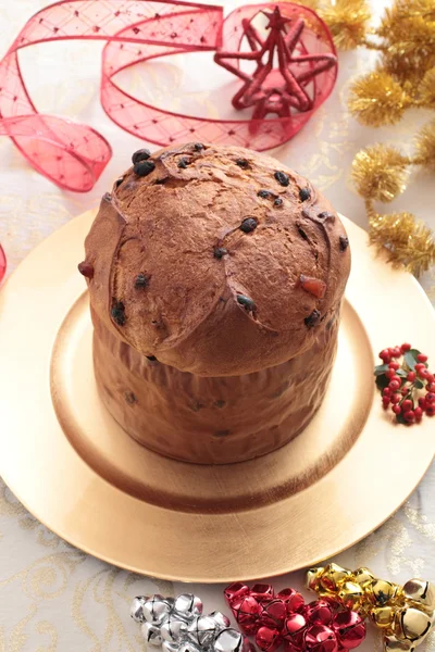 Panettone Christmas cake on plate gold — Stock Photo, Image