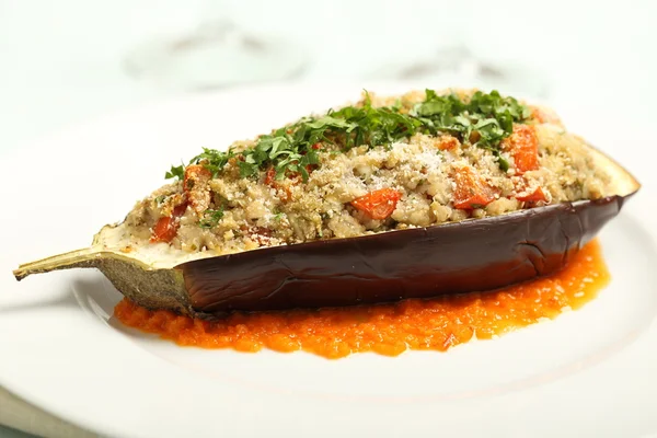 Stuffed eggplant on white plate — Stock Photo, Image