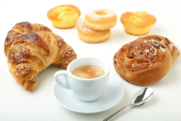 Breakfast with coffee croissant and donuts on white background — Stock Photo, Image