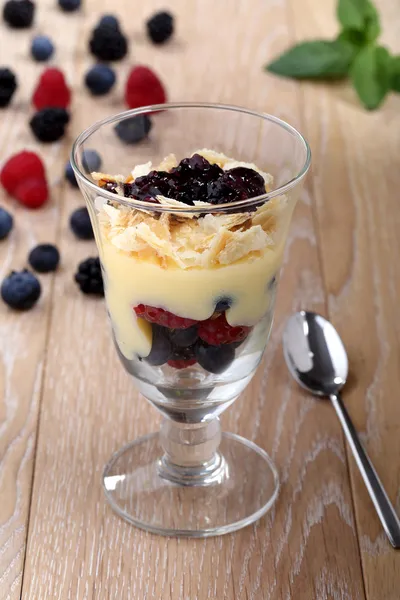 Dessert in glass with millefeuille and berries — Stock Photo, Image