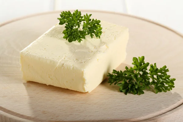 Mantequilla en el tablero de corte — Foto de Stock