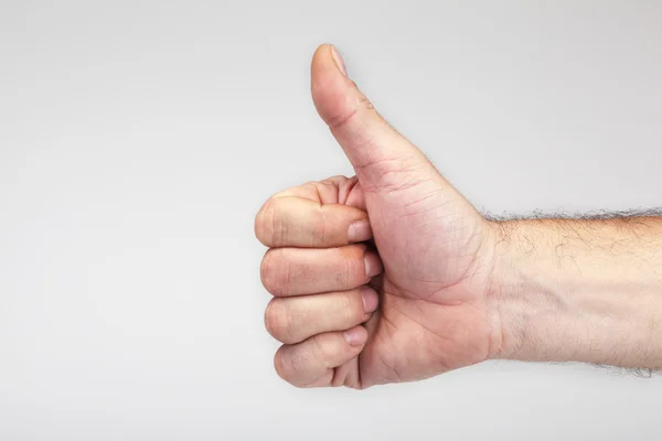 Manlig hand gestikulerande ok tecken — Stockfoto